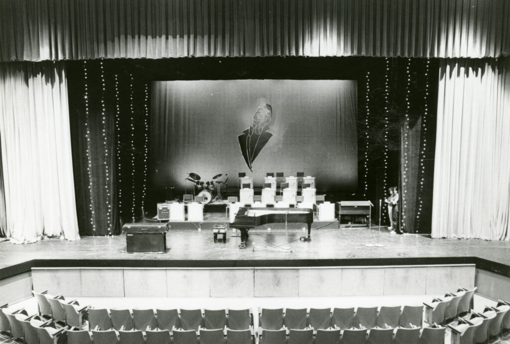 Stage With A Piano And Chairs
