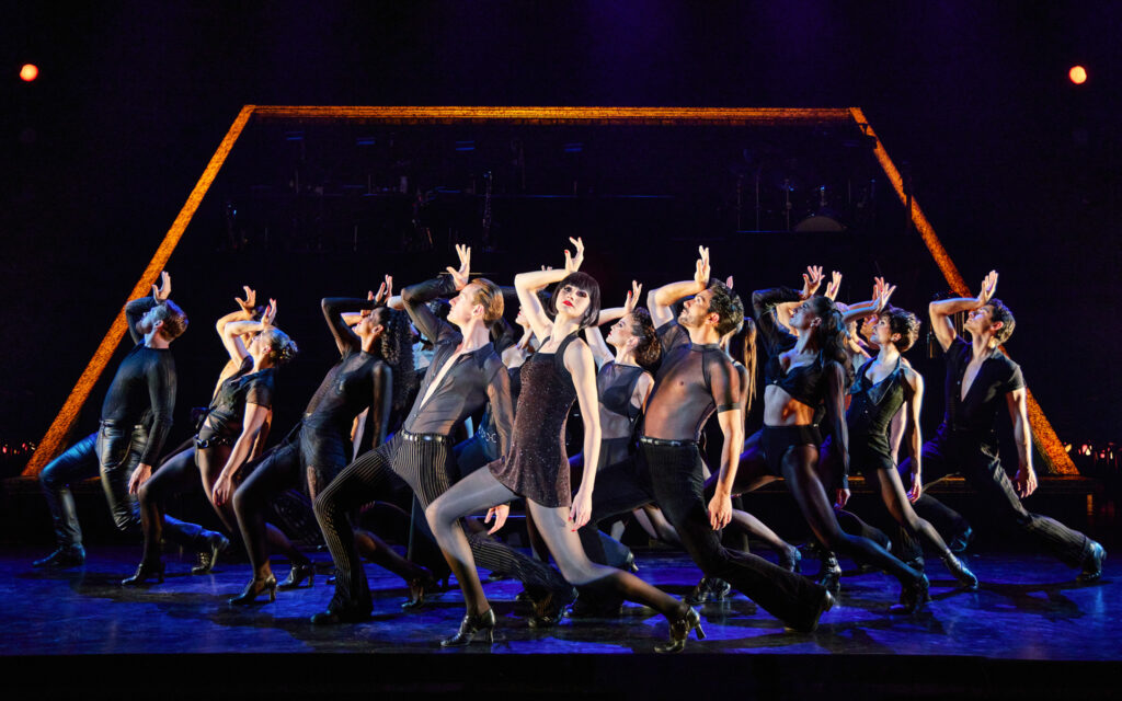 Cast of CHICAGO on stage dancing