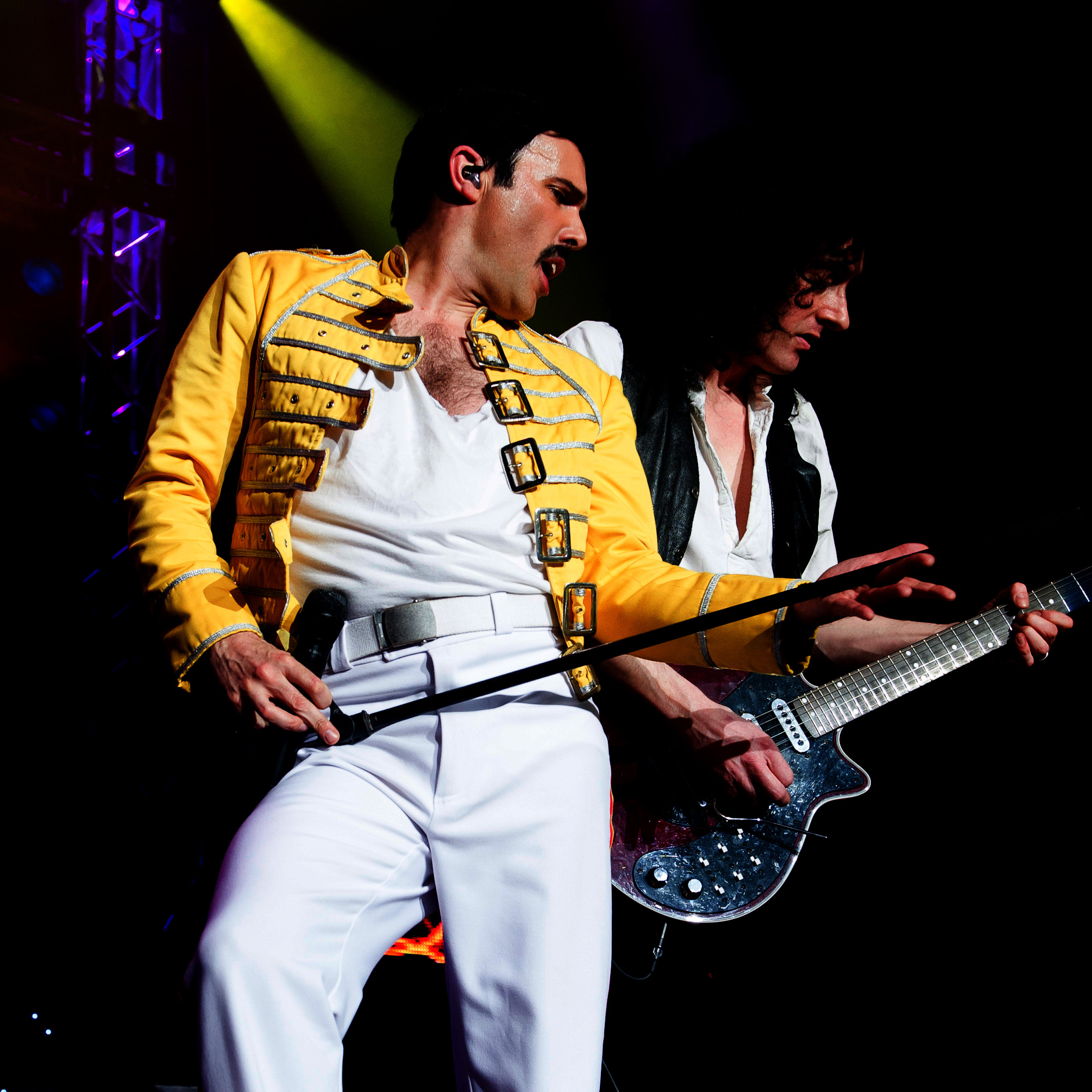 Patrick Meyers as Freddie Mercury on stage.