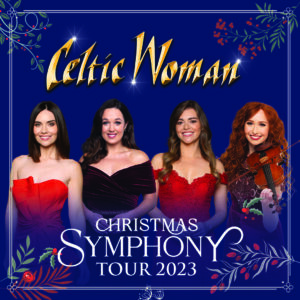 Four members of Celtic Woman posing for a portrait. All are wearing red dresses and smiling