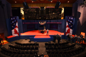 Newlin Hall stage set up for the vice presidential debate with empty chairs in front