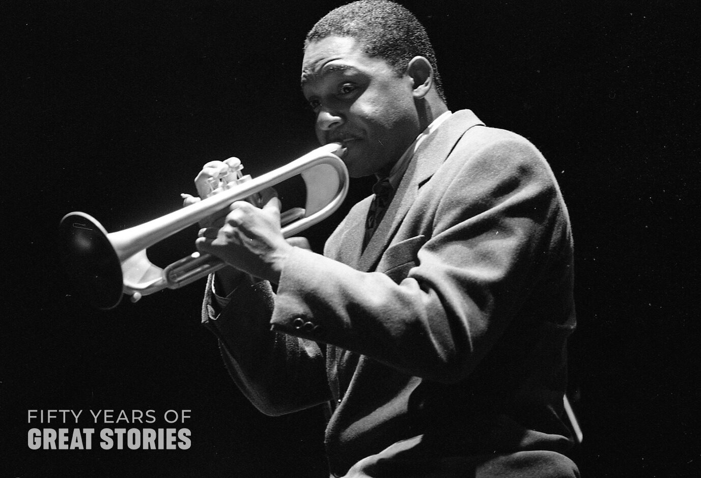 black and white photo of Wynton Marsalis playing the trumpet