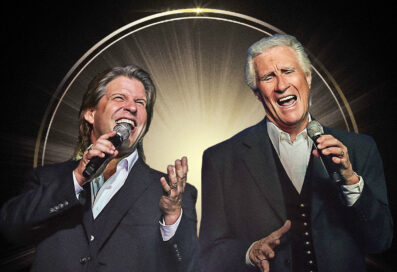 Bill Medley And Bucky Herd Singing Into Microphones